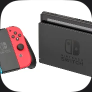 A games console with red and blue controllers beside its dock
